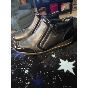 Rieker black water resistant double zip booty style #44278. MSRP $150, like new